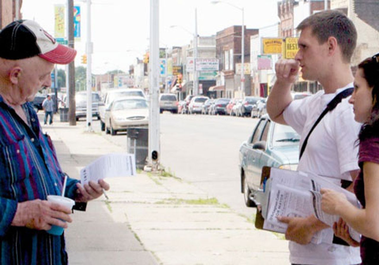 D'Artagnan Collier supporters speak to Don McMurdie on the streets of Southwest Detroit