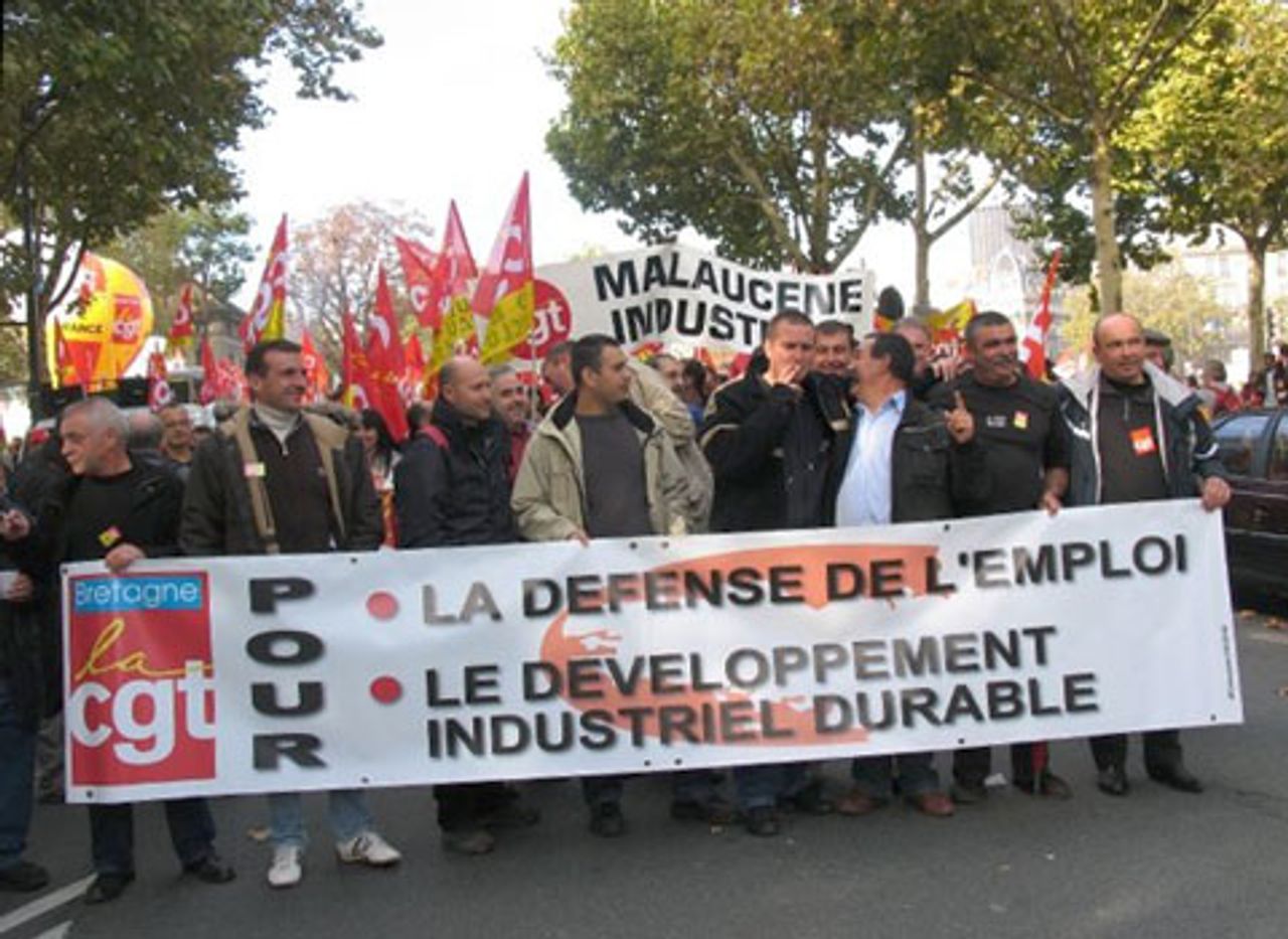 Banner reads: For the defense of jobs and For sustainable industrial development