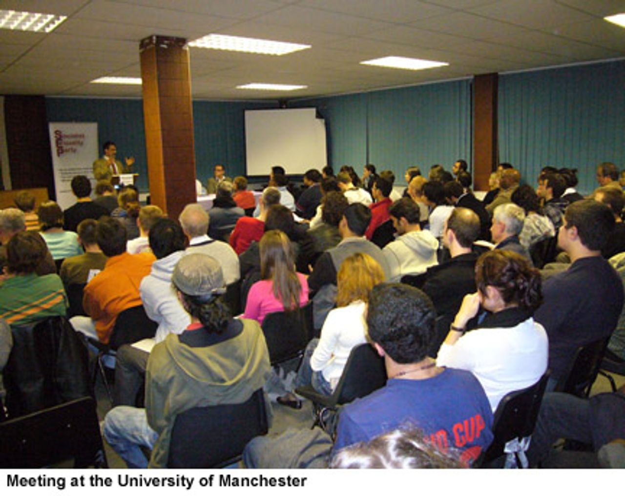 Jerry White speaking to a meeting at the University of Manchester