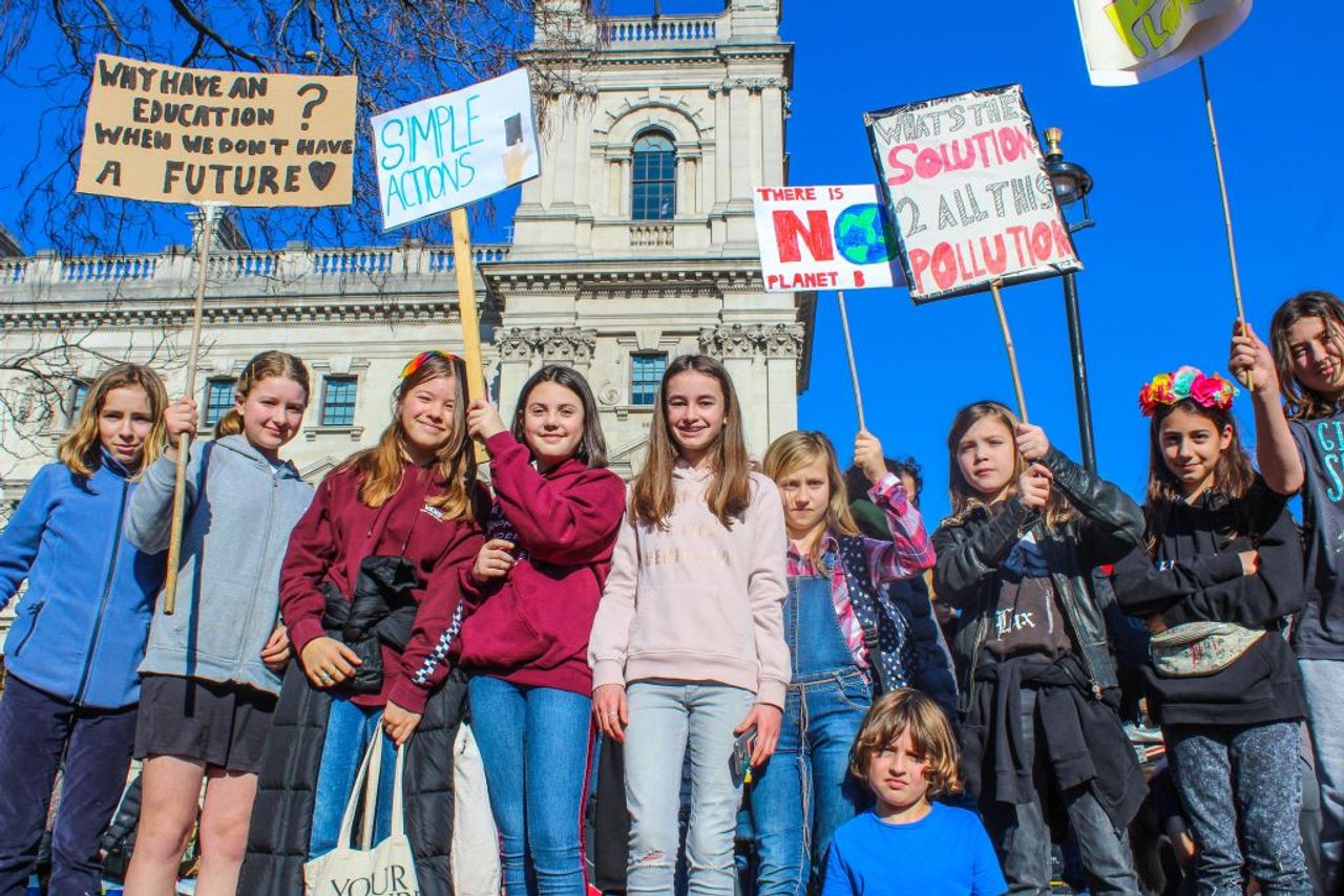 Schoolchildren protest at Parliamant Square in London (Credit: Oliver Cole)