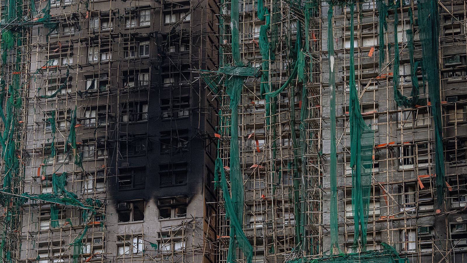 Death toll in Hong Kong fire rises to 94, hundreds still missing