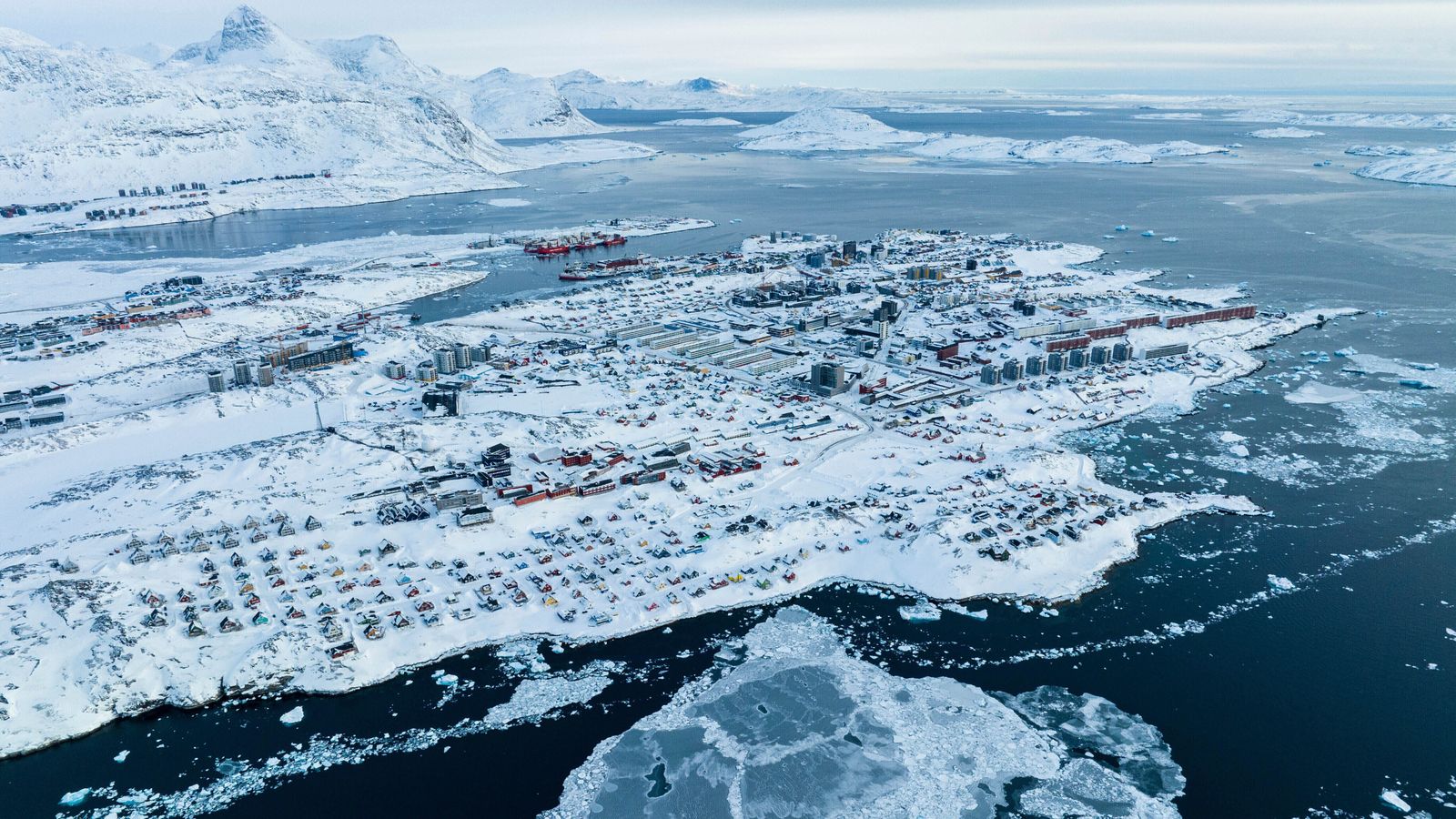 Trump doubles down on threat to seize Greenland, as Danish Foreign Minister set for talks in Washington