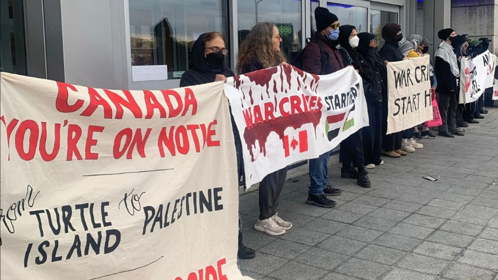 After London, Ontario police raid homes, six World Beyond War peace activists face charges over protest against arms fair