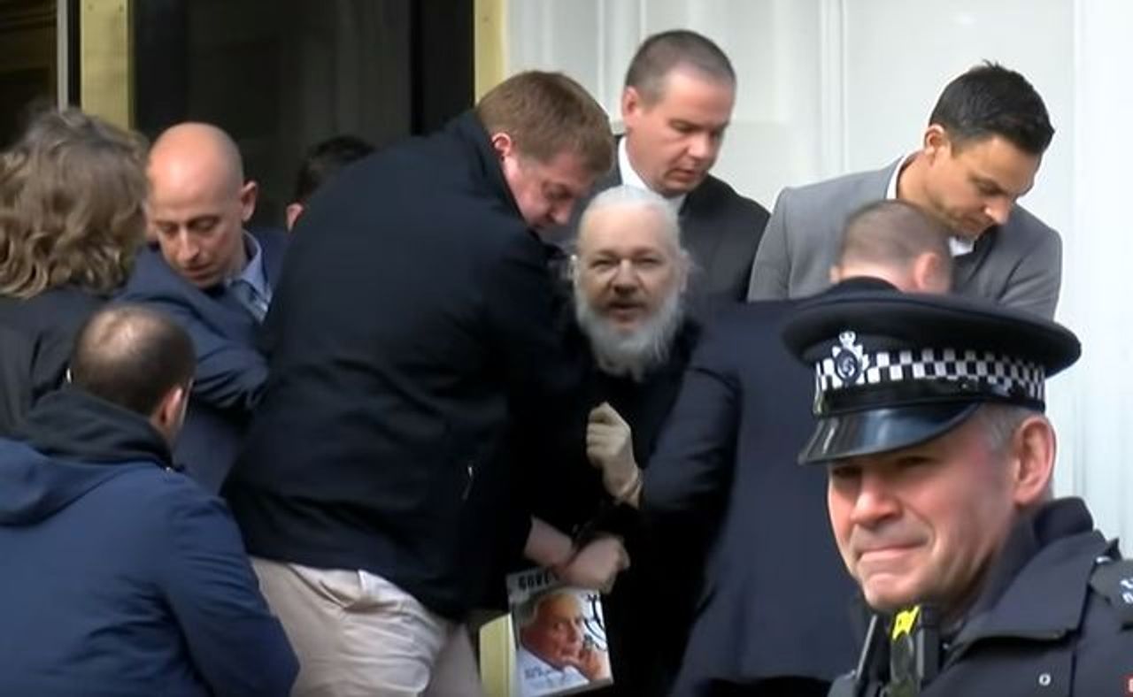 Assange illegally arrested by the British police on April 11