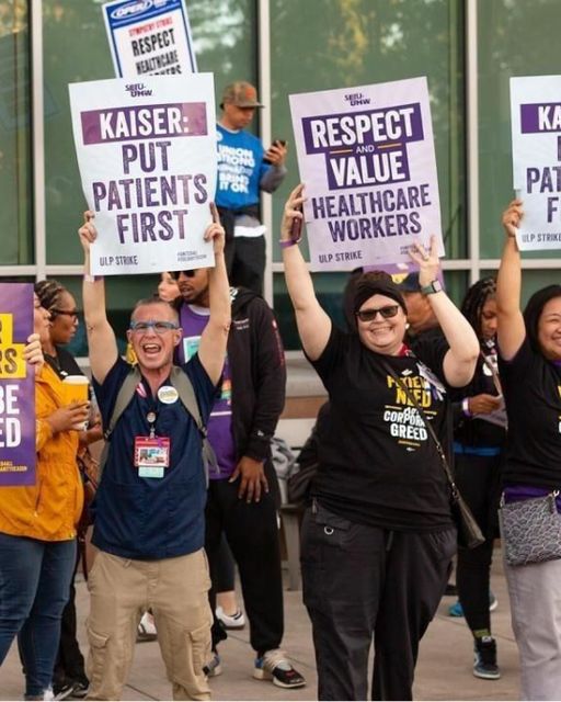 Kaiser healthcare workers on strike holding signs saying PUT PATIENTS FIRST and RESPECT VALUE HEALTHCARE WORKERS