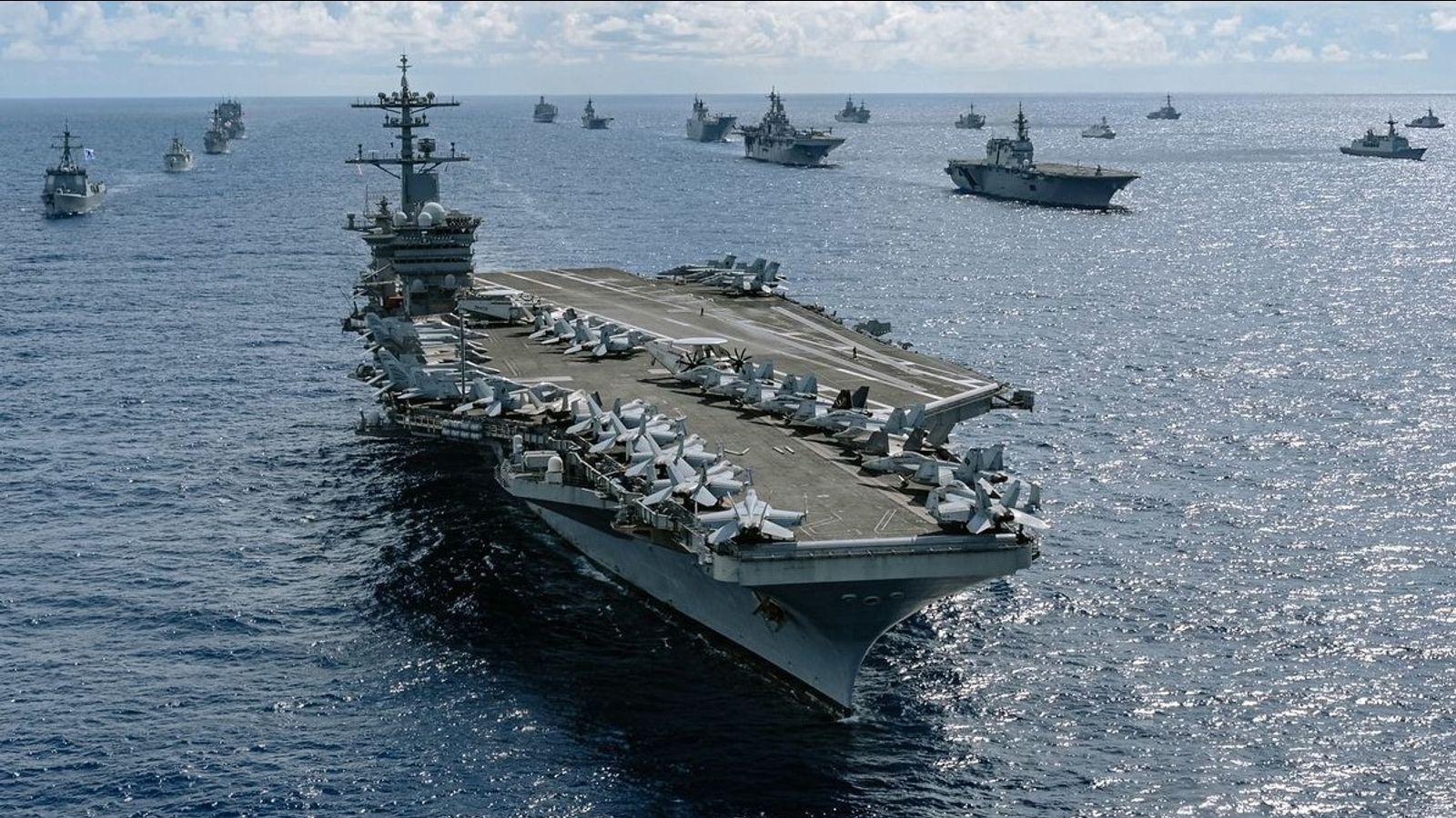 US strike on Iran appears imminent as aircraft carrier task force arrives in Arabian Sea and Trump makes new threats