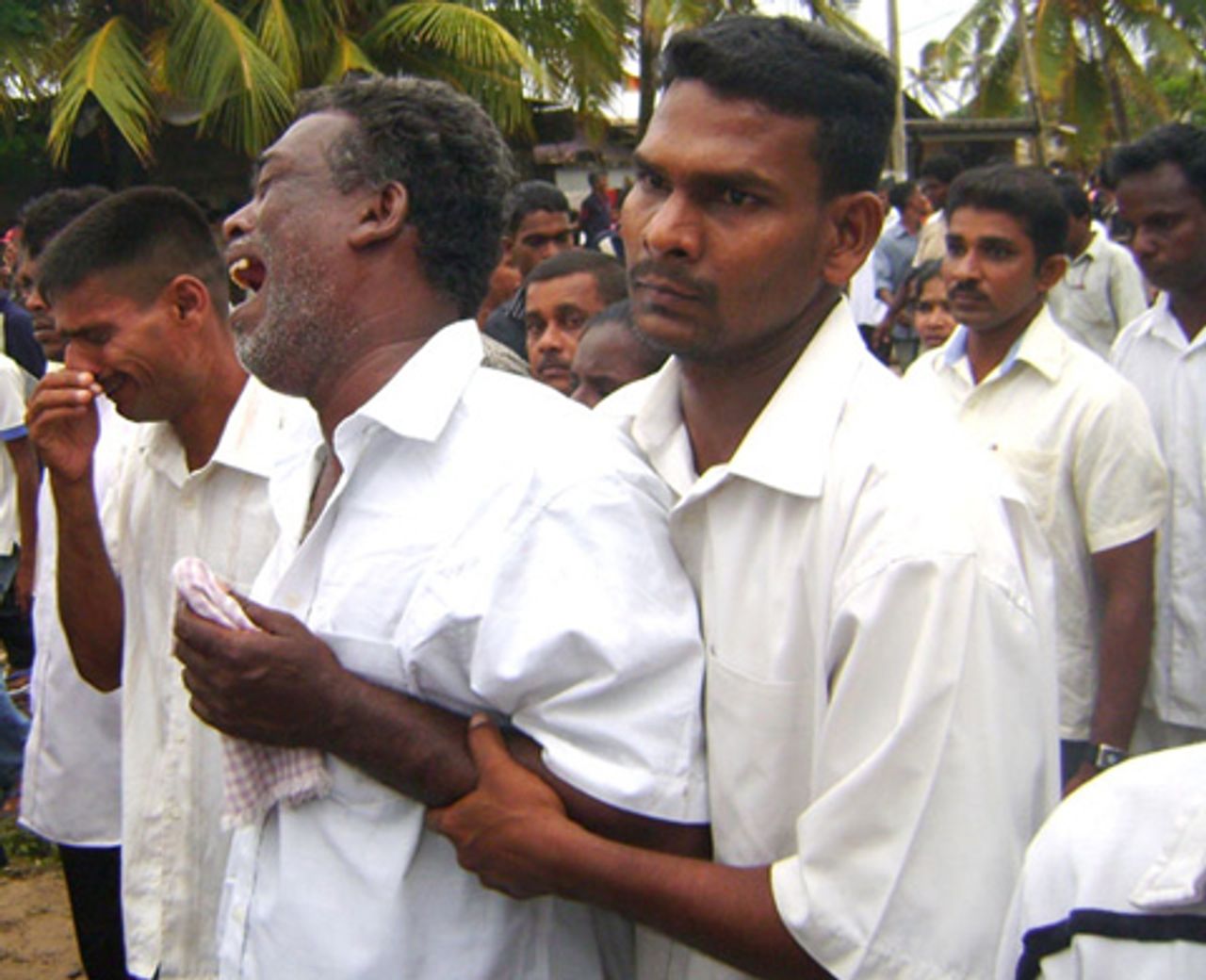 Dhanushka's distressed father at funeral procession