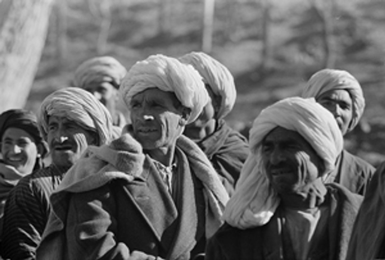 Residents of Kabul watch Eisenhower as he arrives. Thomas J. O'Halloran