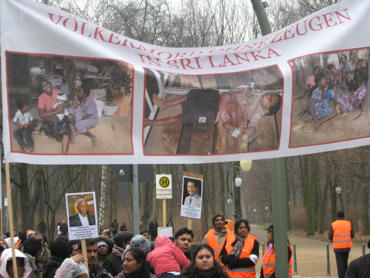 Berlin protesters hold banner reading: A genocide without witnesses in Sri Lanka
