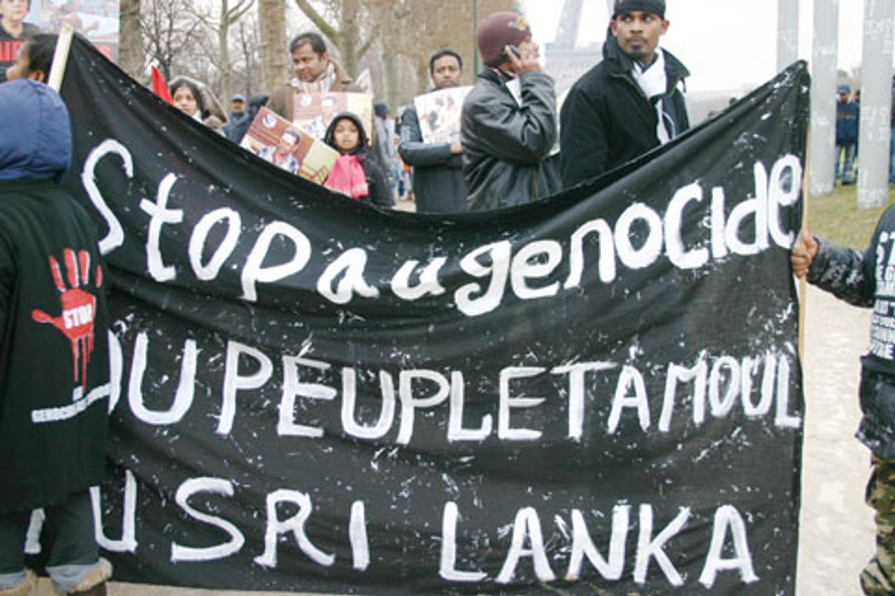 Banner on the Paris demonstration: Stop the genocide of the Tamil people in Sri Lanka