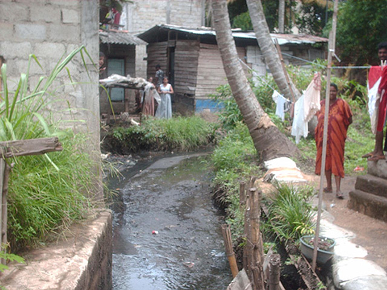 A dirty canal in a Colombo housing estate