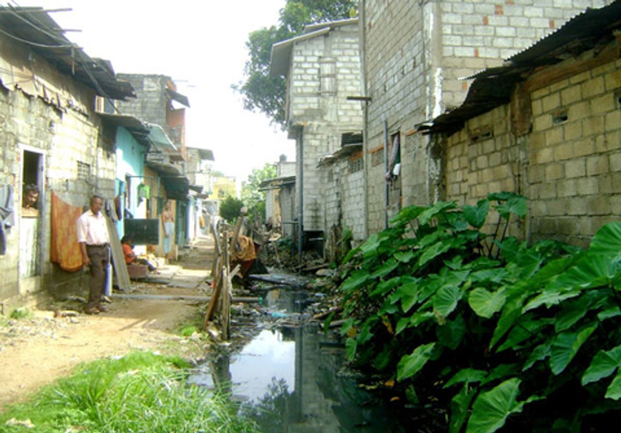 Fetid canal in Apple Watta slum