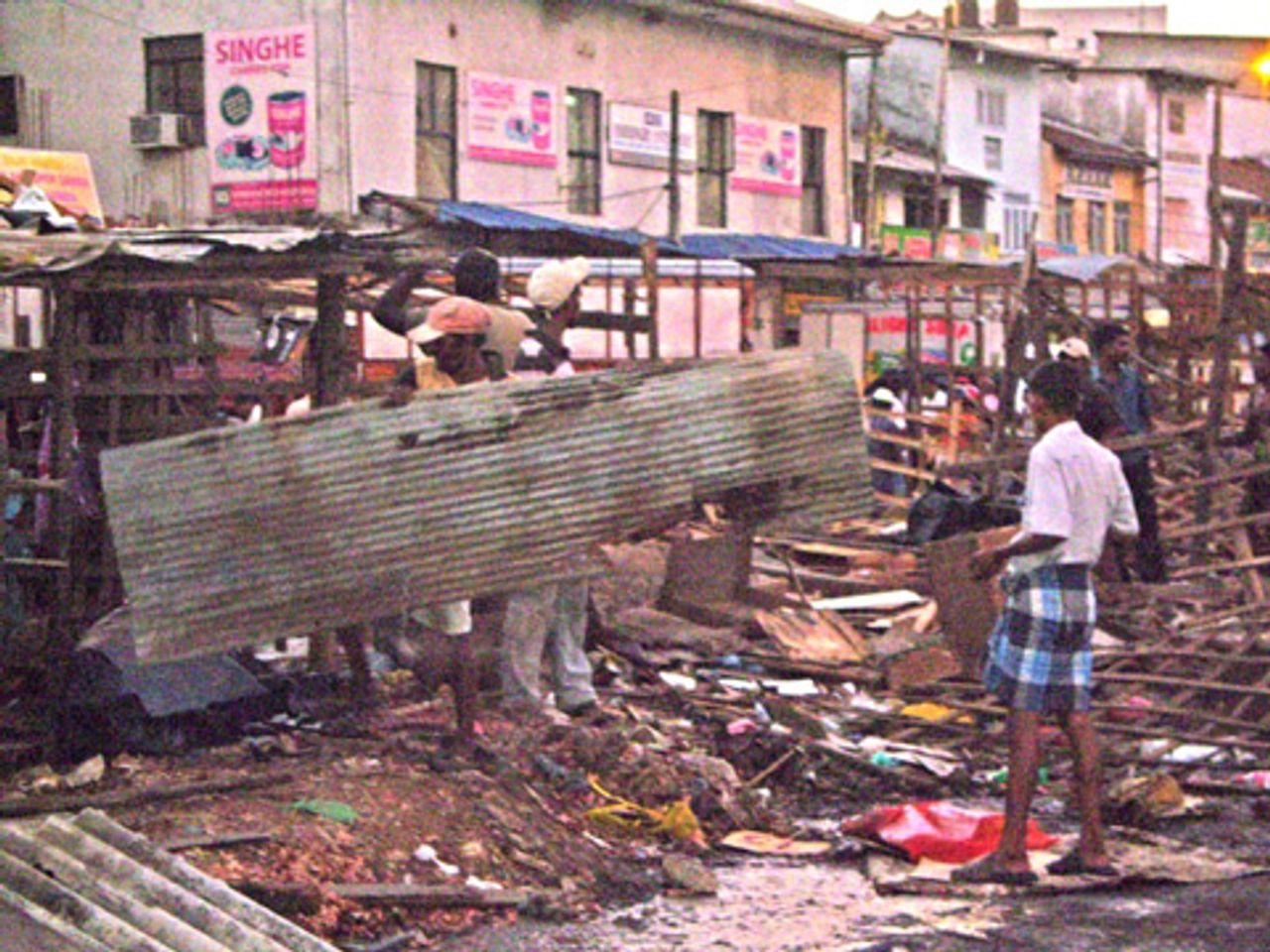 Colombo hawkers after police destroyed their makeshift stalls