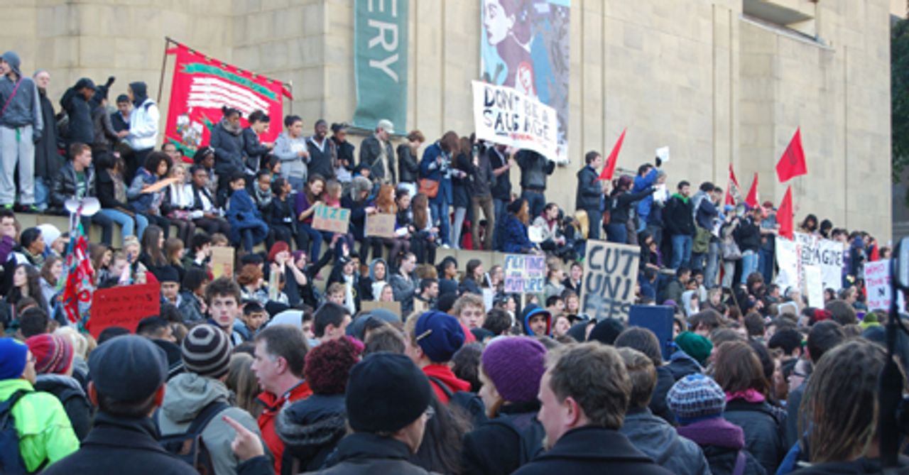 Demonstrators protest outside Leeds Town Hall
