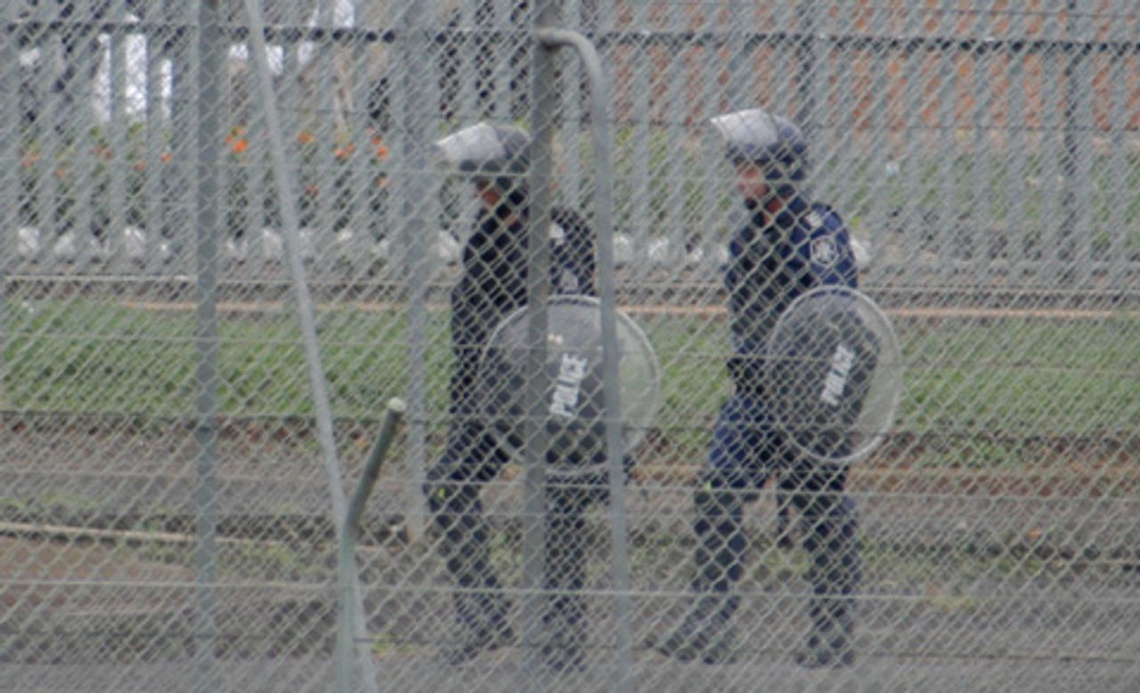 AFP officers in riot gear inside Villawood