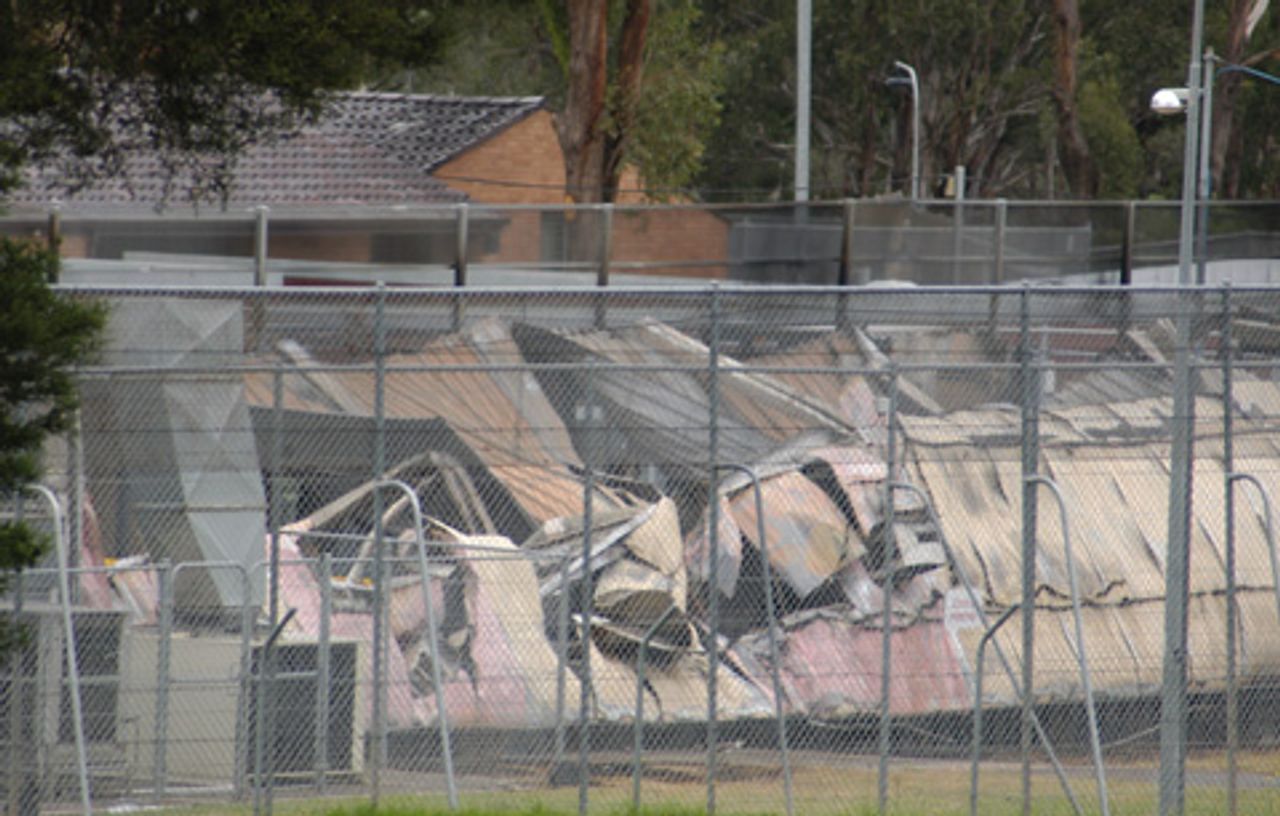 Remains of burnt Villawood buildings