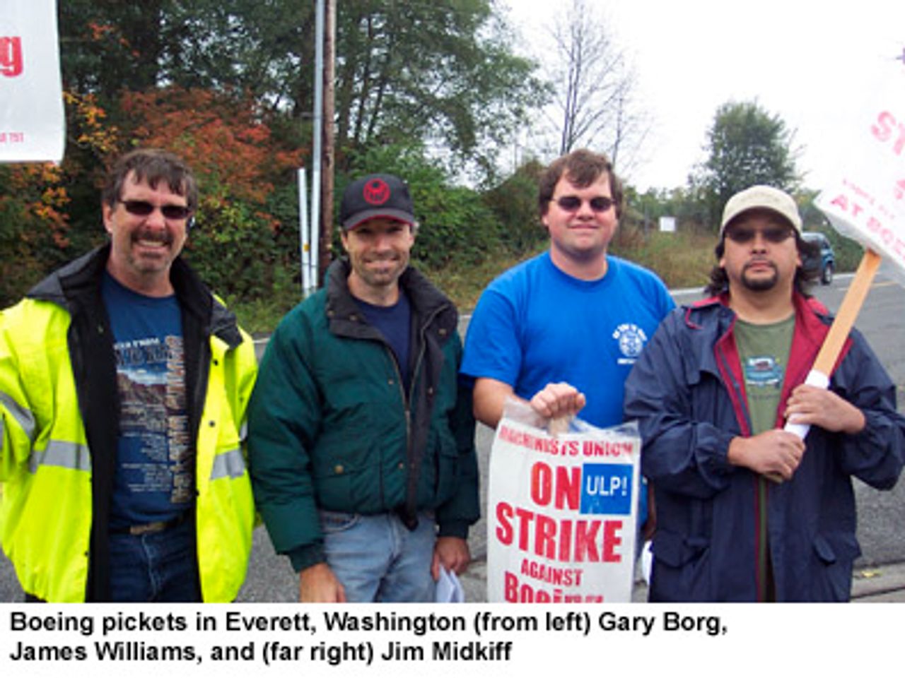 Boeing pickets in Everett, Washington (from left) Gary Borg, James Williams, and (far right) Jim Midkiff