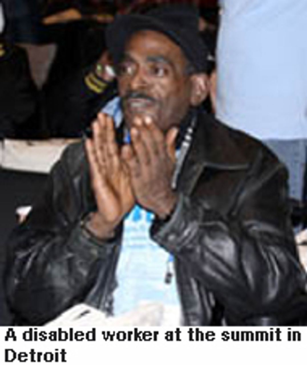 A disabled worker at the summit in Detroit